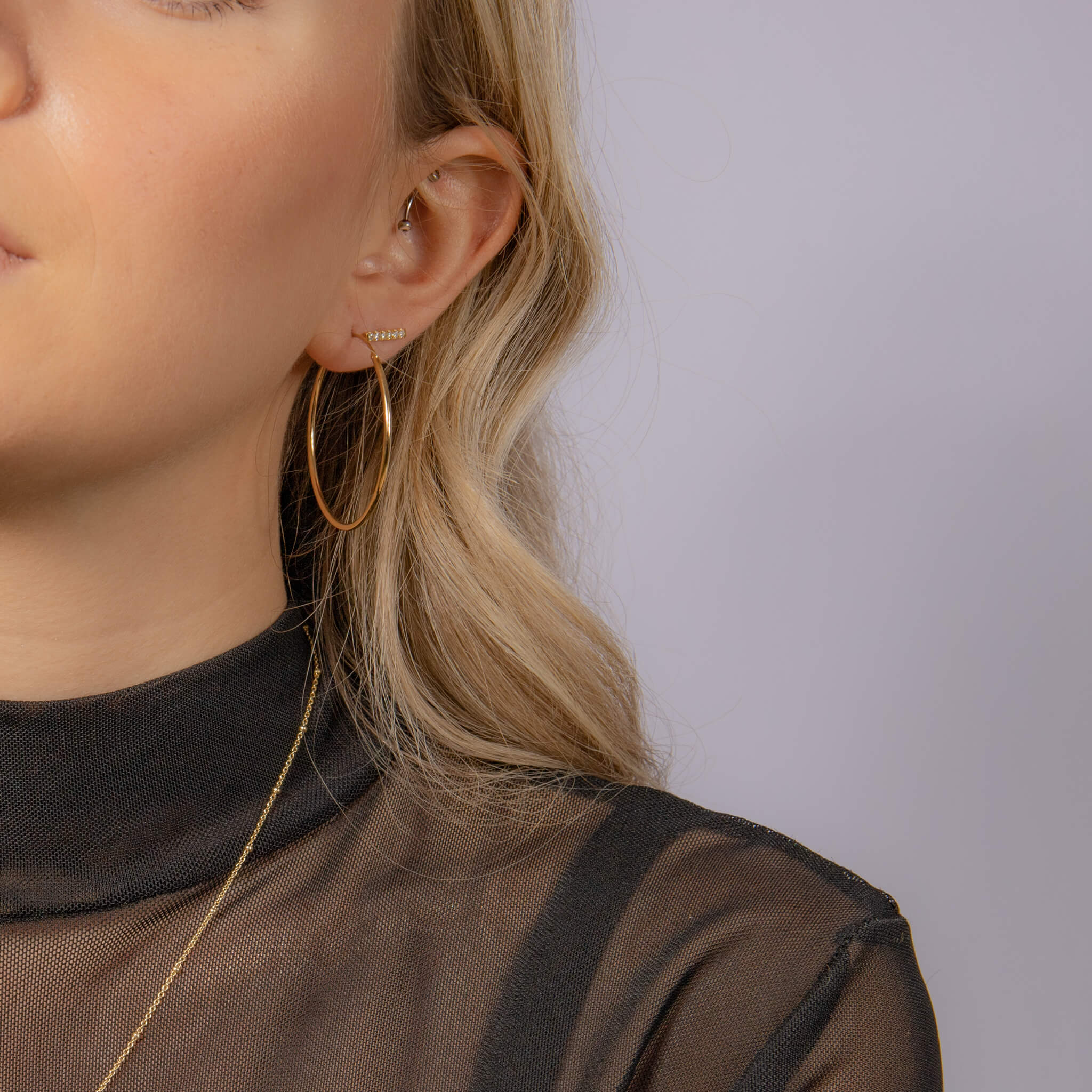 Les boucles d’oreilles ROMY