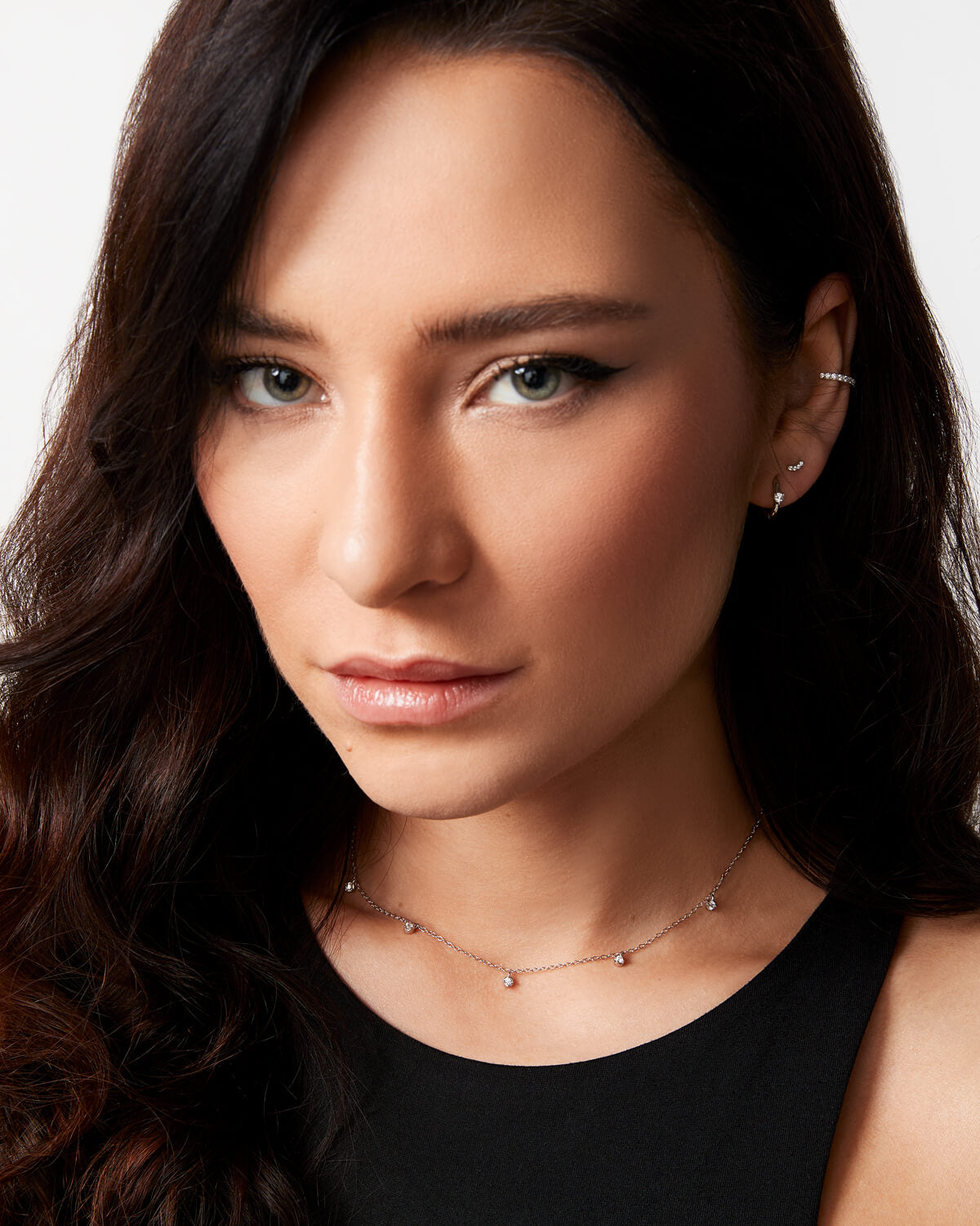 Les boucles d’oreilles MAYA